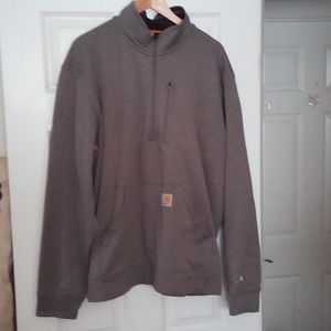 The Carhartt gray men's sweater is very warm and in good condition.